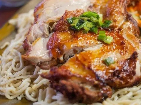 Ben Tre five-spice chicken served over garlic noodles