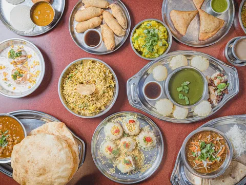 Overhead spread of South Indian vegetarian thali dishes at Shri Balaji Bhavan