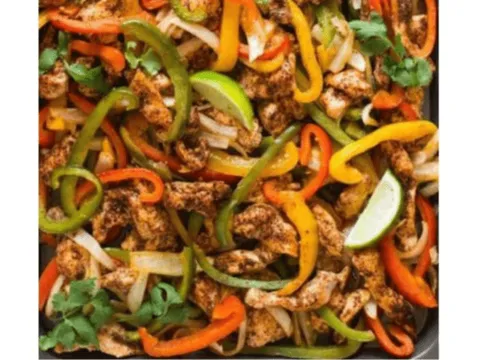 Chicken fajitas with peppers and onions at Portales Taqueria