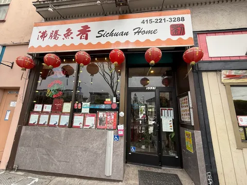 Storefront hung with red lanterns at Sichuan Home