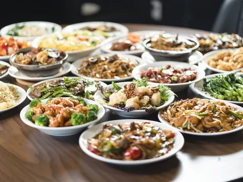Table spread of Cantonese dishes at Yummy House China Bistro in Tampa