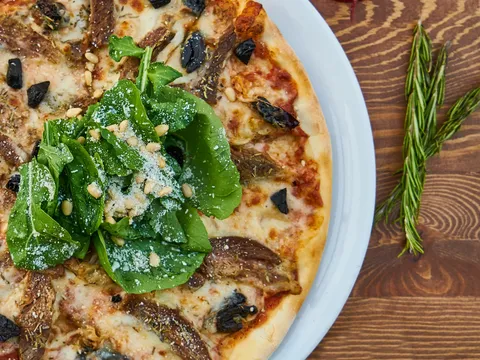 A specialty pizza from Fresco Pizzeria & Italian Eatery