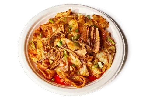 Bowl of hand-ripped noodles with cumin lamb at Xi'an Famous Foods