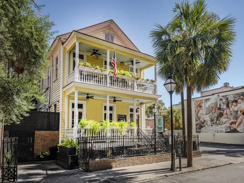 Poogan's Porch's yellow Victorian house on Queen Street