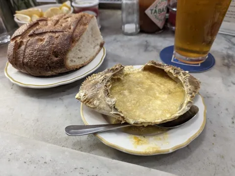 Half cracked crab and sourdough bread at Swan Oyster Depot's marble counter