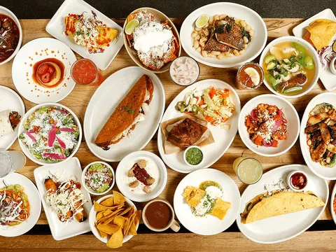 Large overhead spread of Mexican dishes at Nopalito