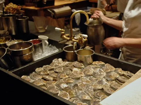 Maine oysters being prepared in the open kitchen at Fore Street