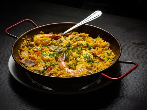 Seafood paella with shrimp and herbs at Oyo